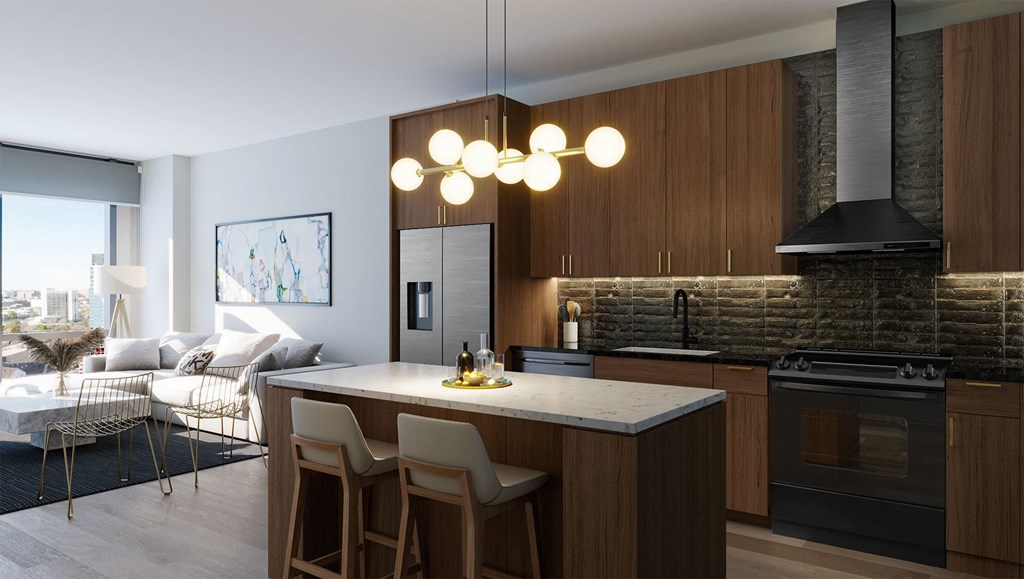 a kitchen and living room in an apartment