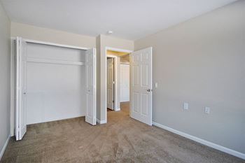 Carlyle place apartments bedroom with plush carpet