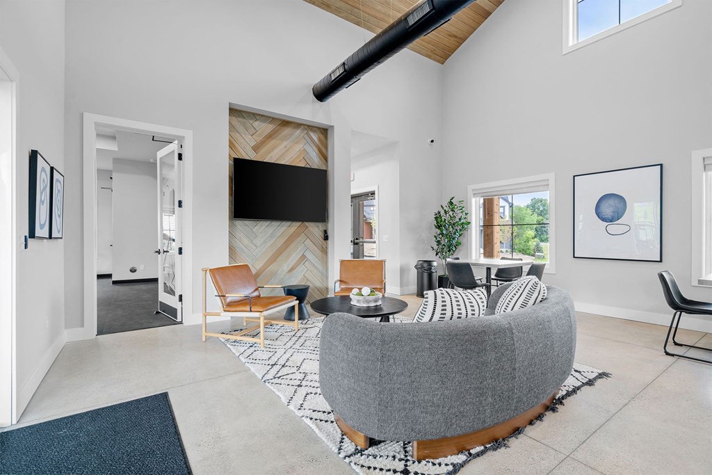 a living room with a couch and a tv