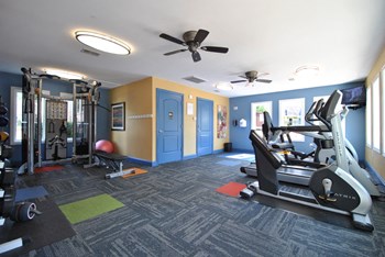 coolidge place townhomes fitness center - Photo Gallery 16