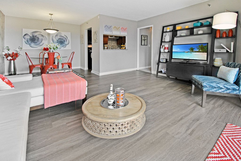 a living room with a couch and a tv