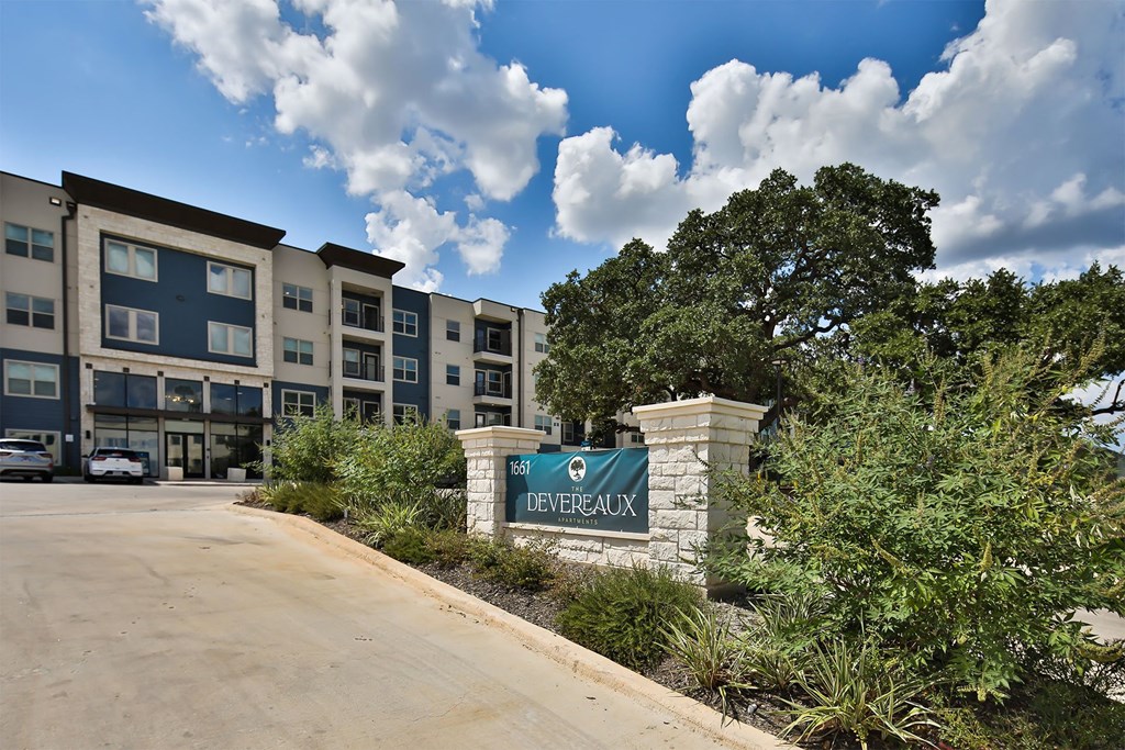 A sign that says "Sot Devereaux" is in front of a building.