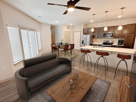 A modern living room with a grey sofa and a wooden coffee table.