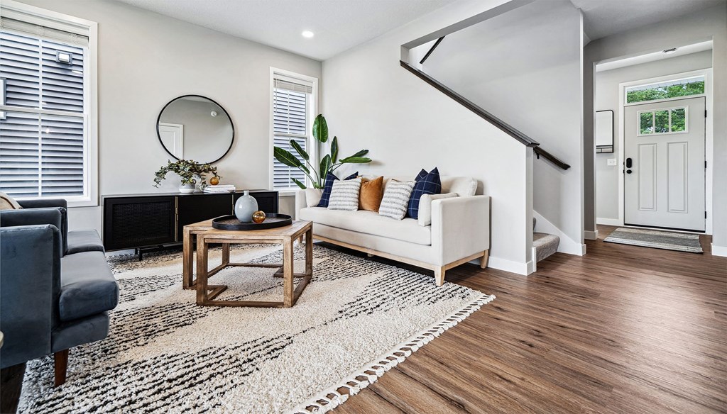 a living room with a couch and a table
