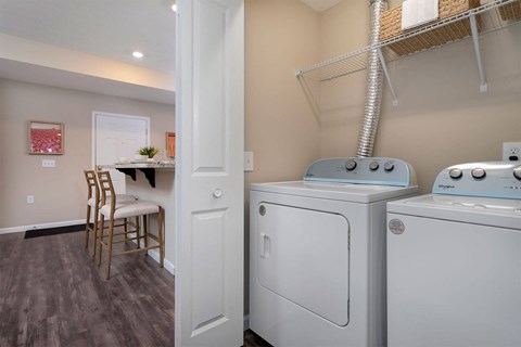 A laundry room with a washer and dryer.