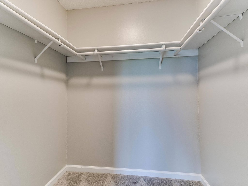 the preserve at ballantyne commons empty storage room with white walls and white pipes