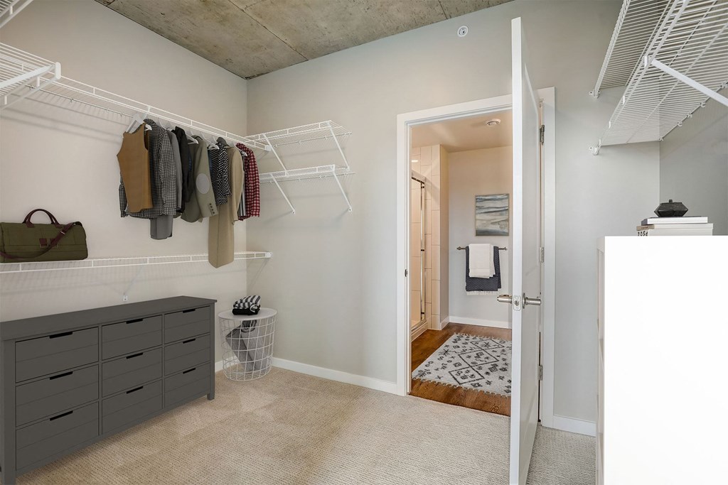 a walk in closet in a 555 waverly unit
