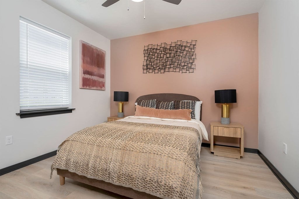 bedroom with a bed and nightstands