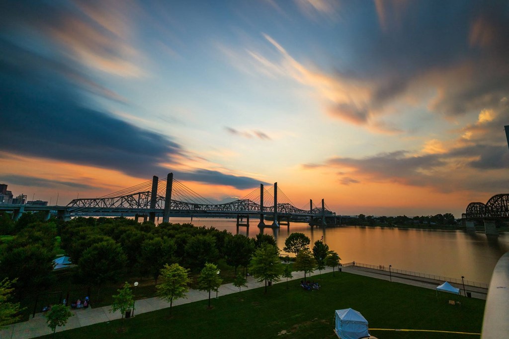 the bridge over the river at sunset