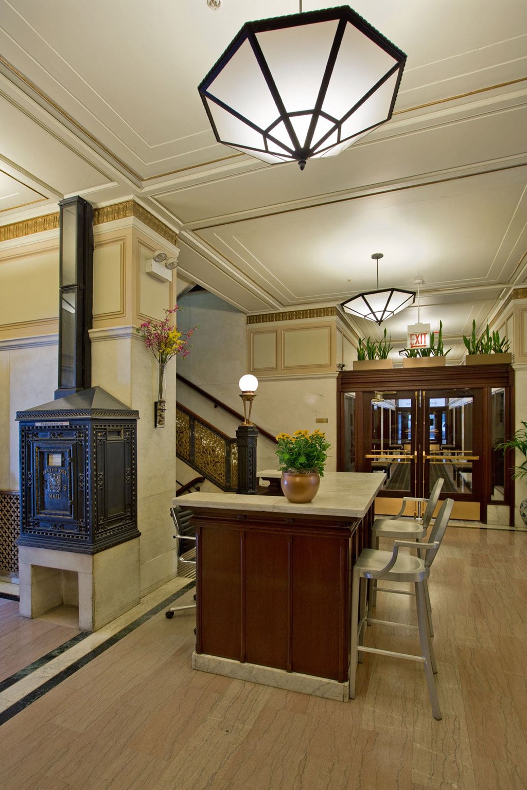 a dining room with a table and chairs and a fireplace