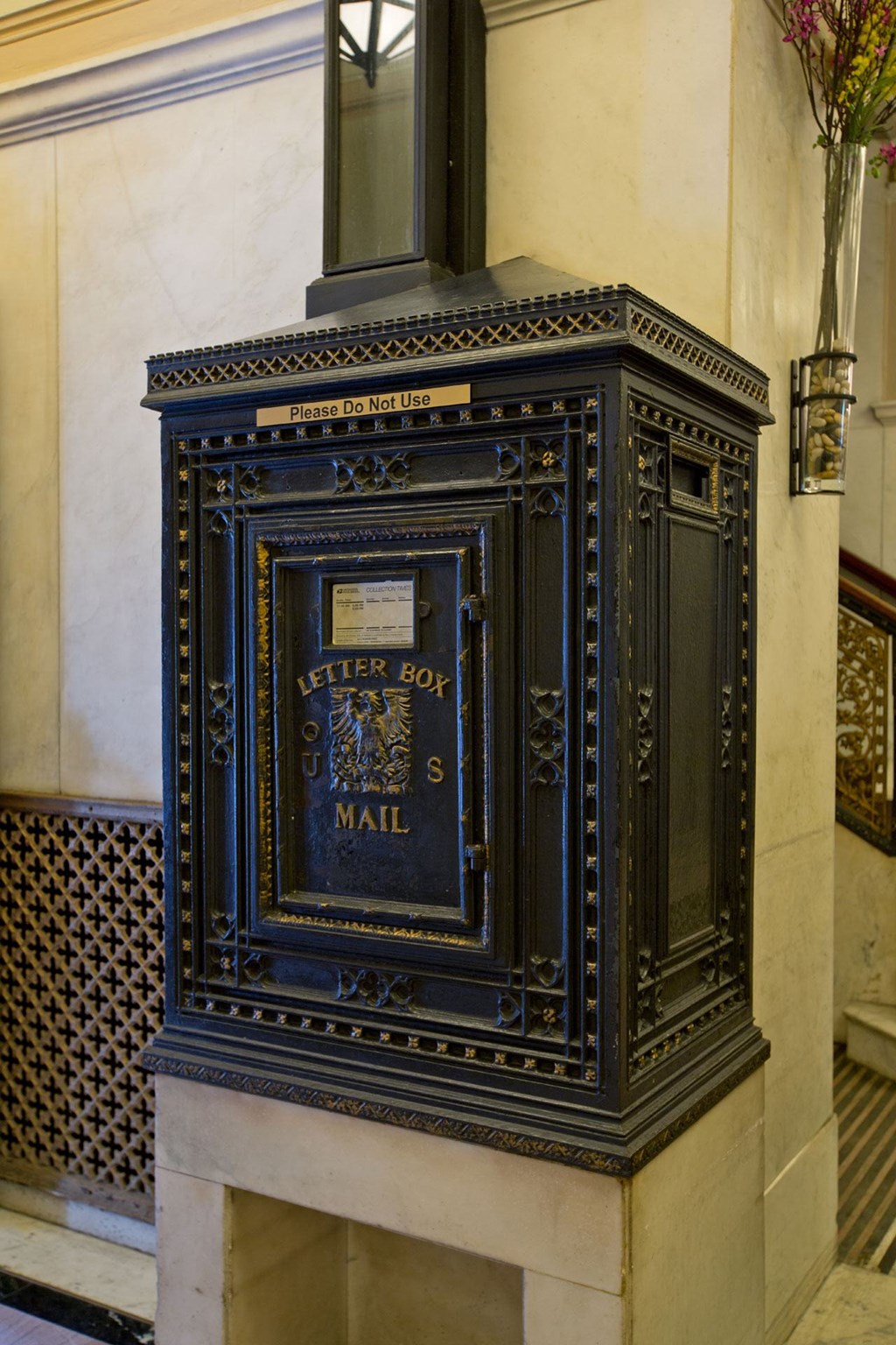 an old mail box on the side of a building
