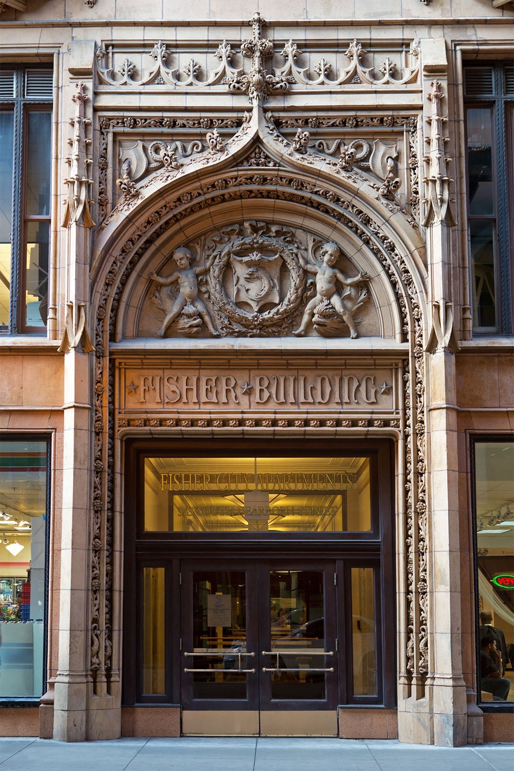 the entrance to the fisher building in the city