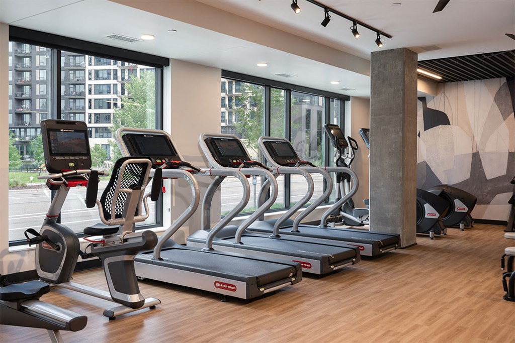 forte on the park apartments fitness center with cardio eqiupment