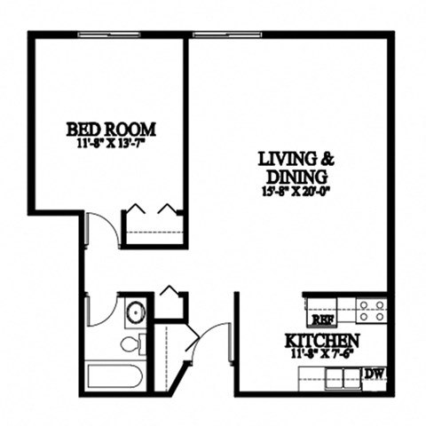 A floor plan of a small apartment with a bedroom, living and dining area, and kitchen.
