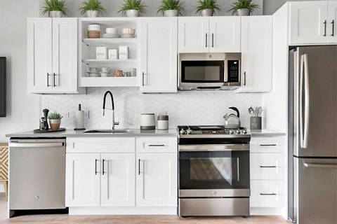 Albion Highland Park Apartment Kitchen and White Cabinets