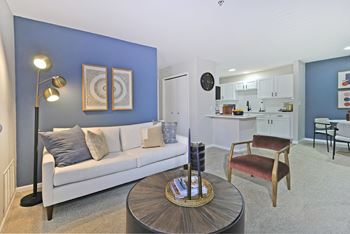 a living room with a couch and a table