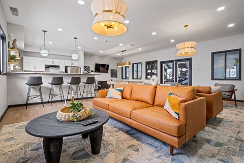 a living room with a couch and a table