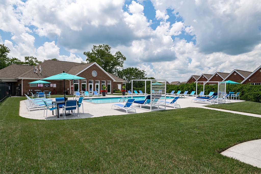 our apartments have a large pool and lounge chairs