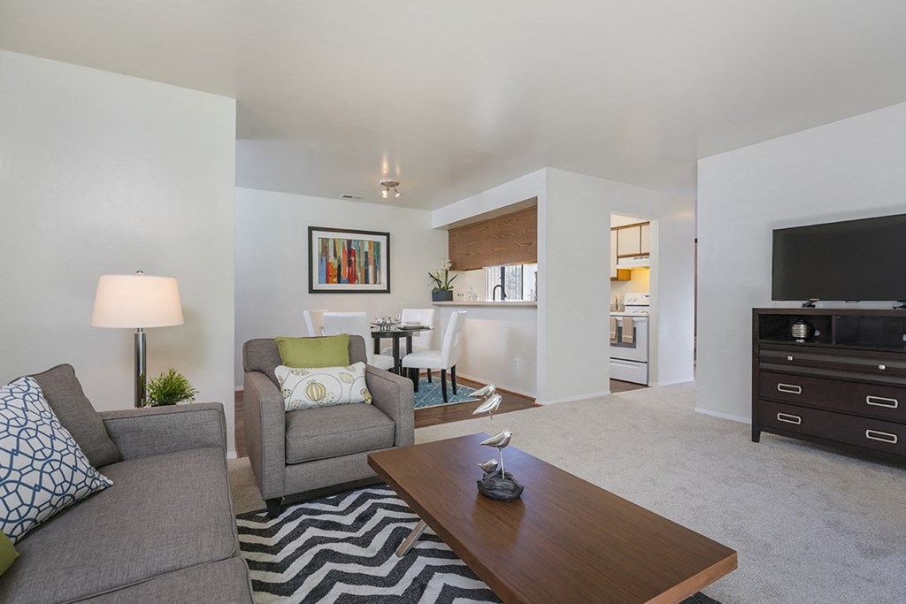 a living room with a couch and a table