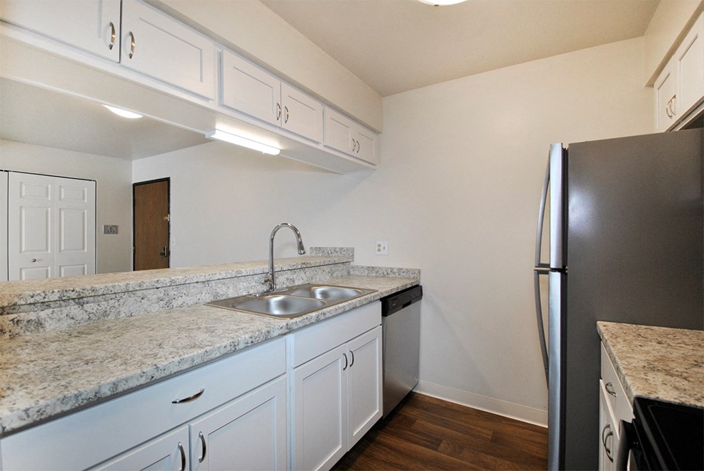 the preserve at ballantyne commons apartment kitchen with stainless steel appliances