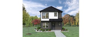 a home with a green lawn and trees in the background