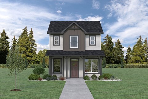 a home with a green lawn and trees in the background