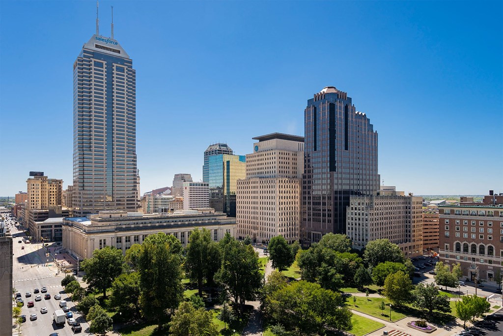 a view of the city skyline from a skyscraper