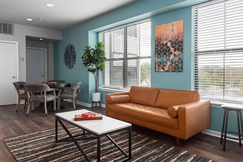a living room with a couch and a table