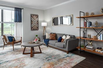 a living room with a couch and a coffee table