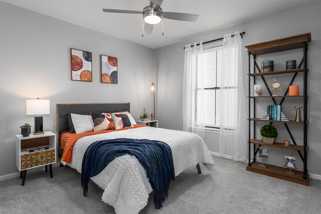 bedroom in top model home at the district at highland park apartments