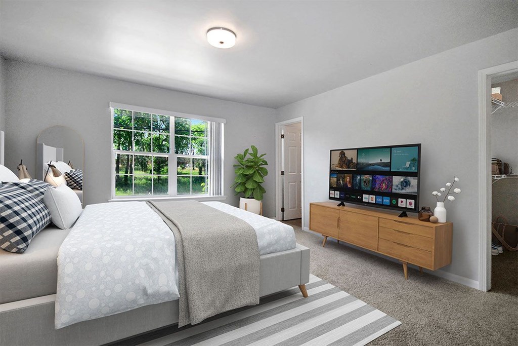 bedroom with a bed and tv