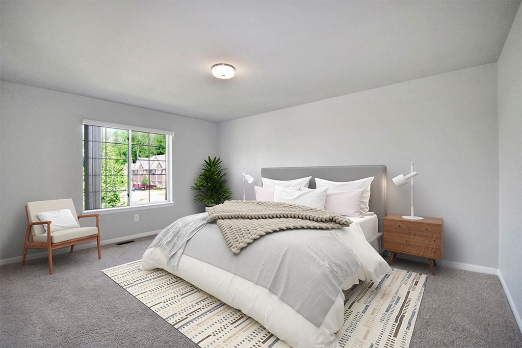 bedroom with large bed and a window