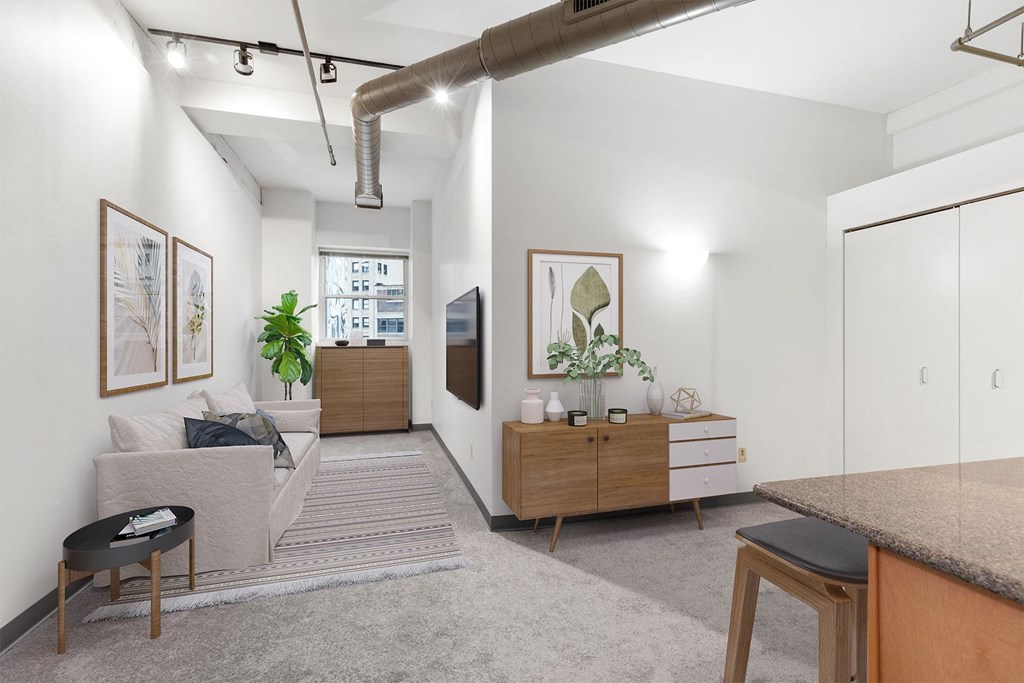 a living room with a couch and a table