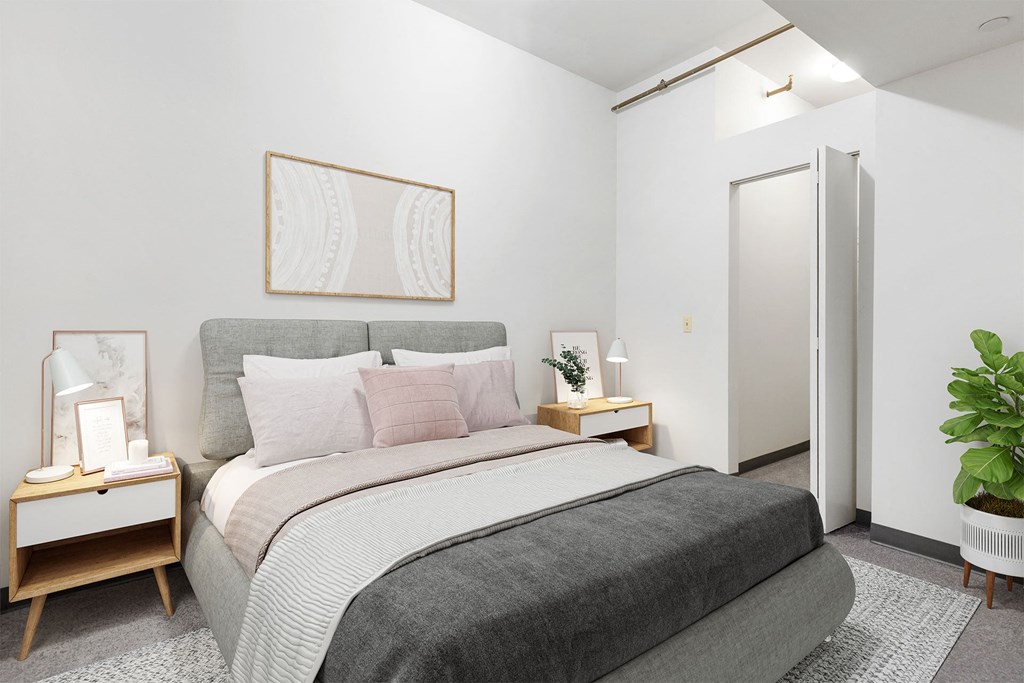 a bedroom with a bed and a closet