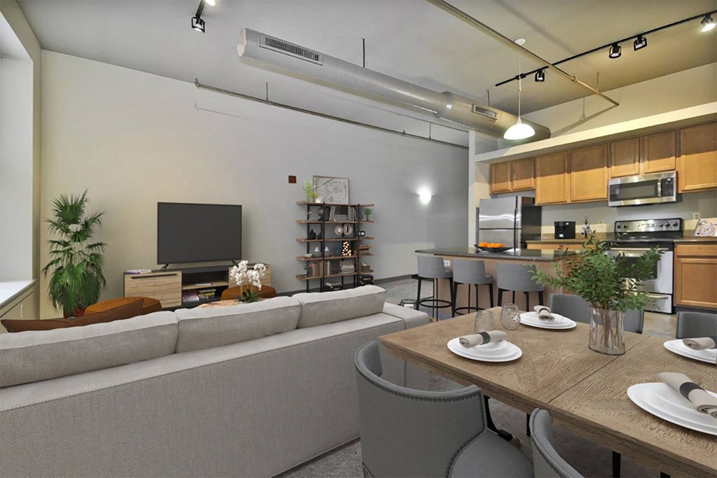 a view of the living room and kitchen from the dining room