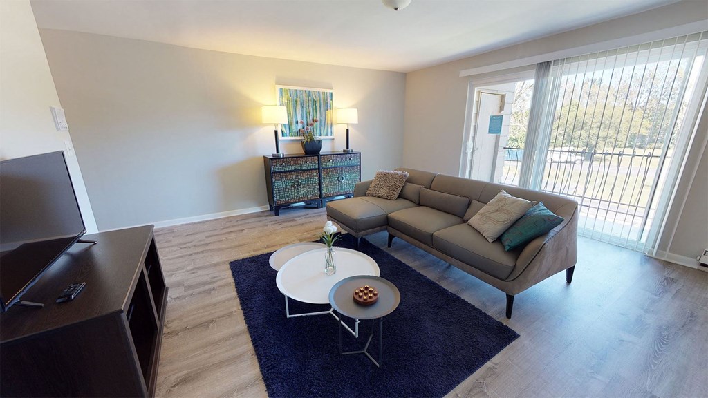 a living room with a couch and a table