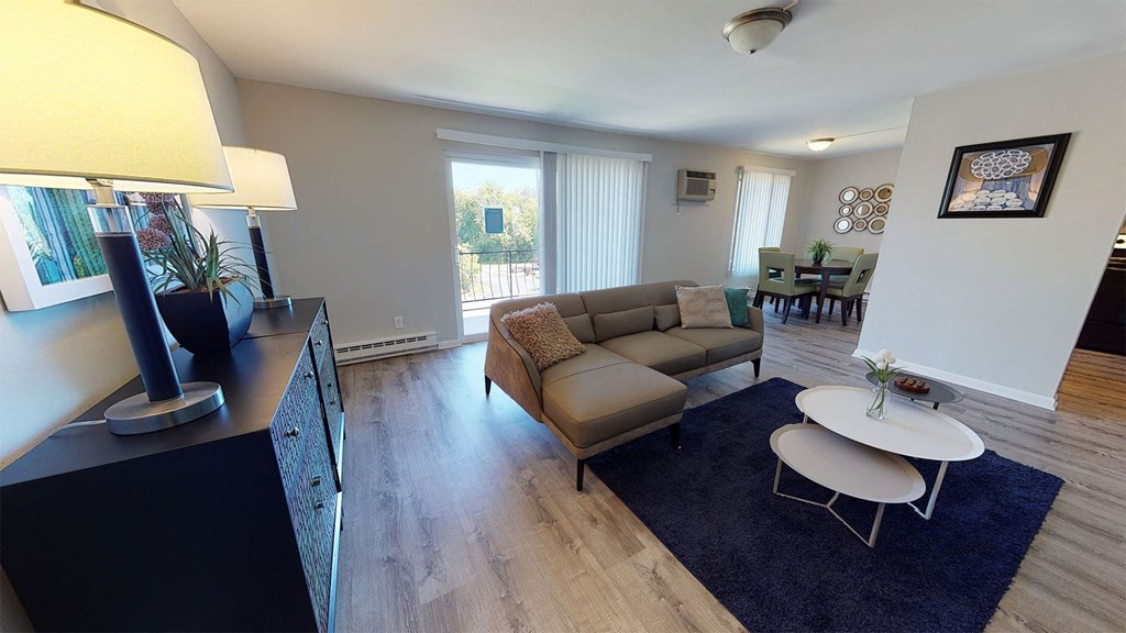 a living room with a couch and a table