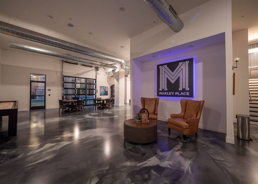A spacious room with a Harley Place sign on the wall.