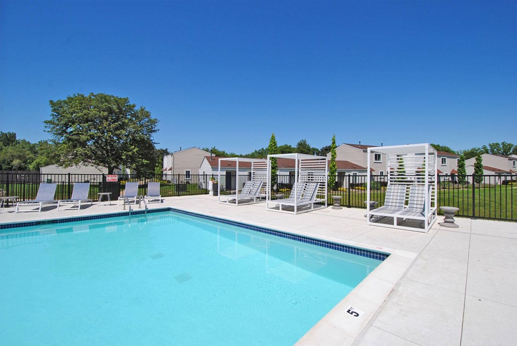 our apartments have a swimming pool with chaise lounge chairs