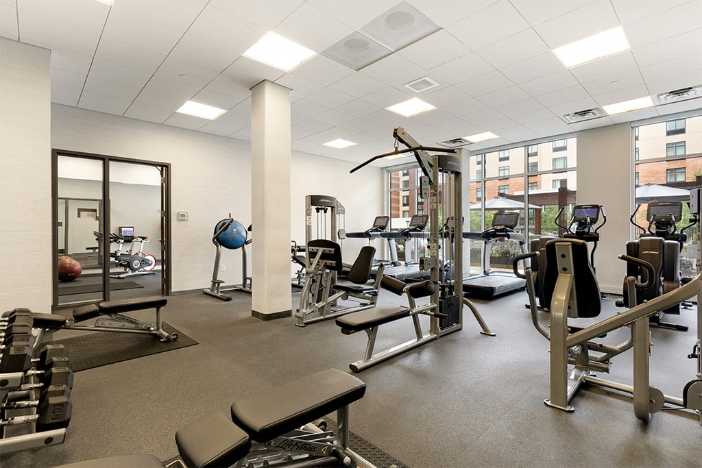 a gym with cardio equipment and weights in the new yorker magazine building