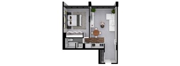 A small room with a bed, a table, and a microwave.