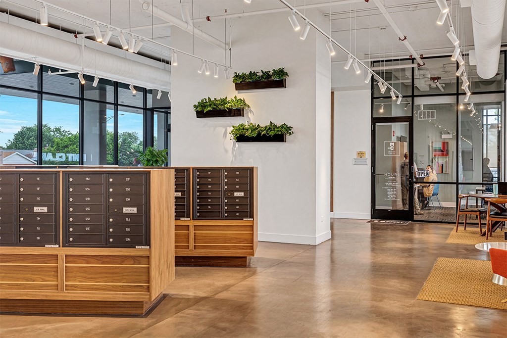 a restaurant with wooden furniture and plants on the wall