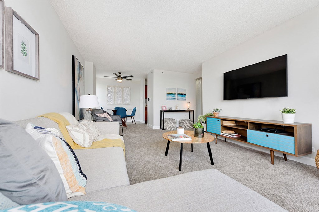 a living room with a couch and a tv