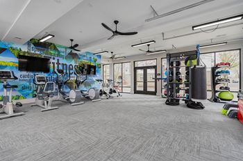 the gym at the flats at big tex apartments