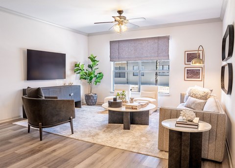 a living room with a couch and a tv