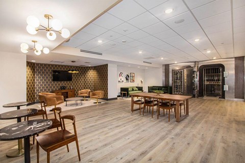 A room with wooden floors and furniture.