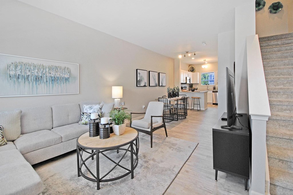 a living room with a couch and a tv