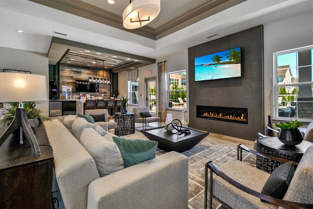 a living room with a couch and a fireplace