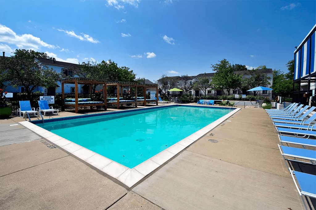 a swimming pool at the resort on a sunny day