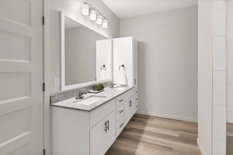 the preserve at ballantyne commons apartments bathroom with sink and mirror